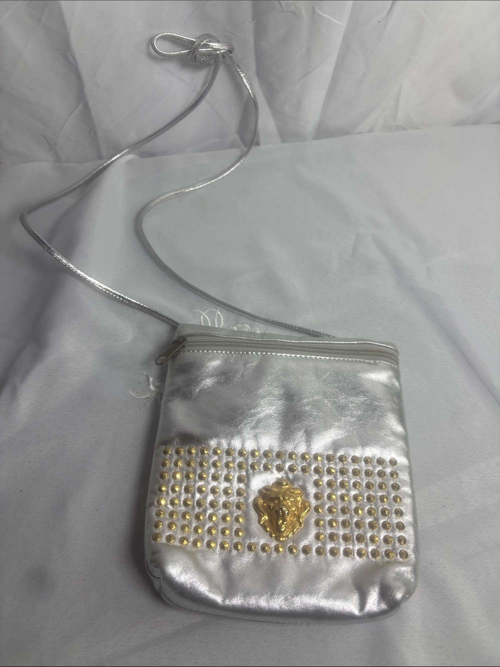 Silver Crossbody Bag with Gold Stud and Medallion